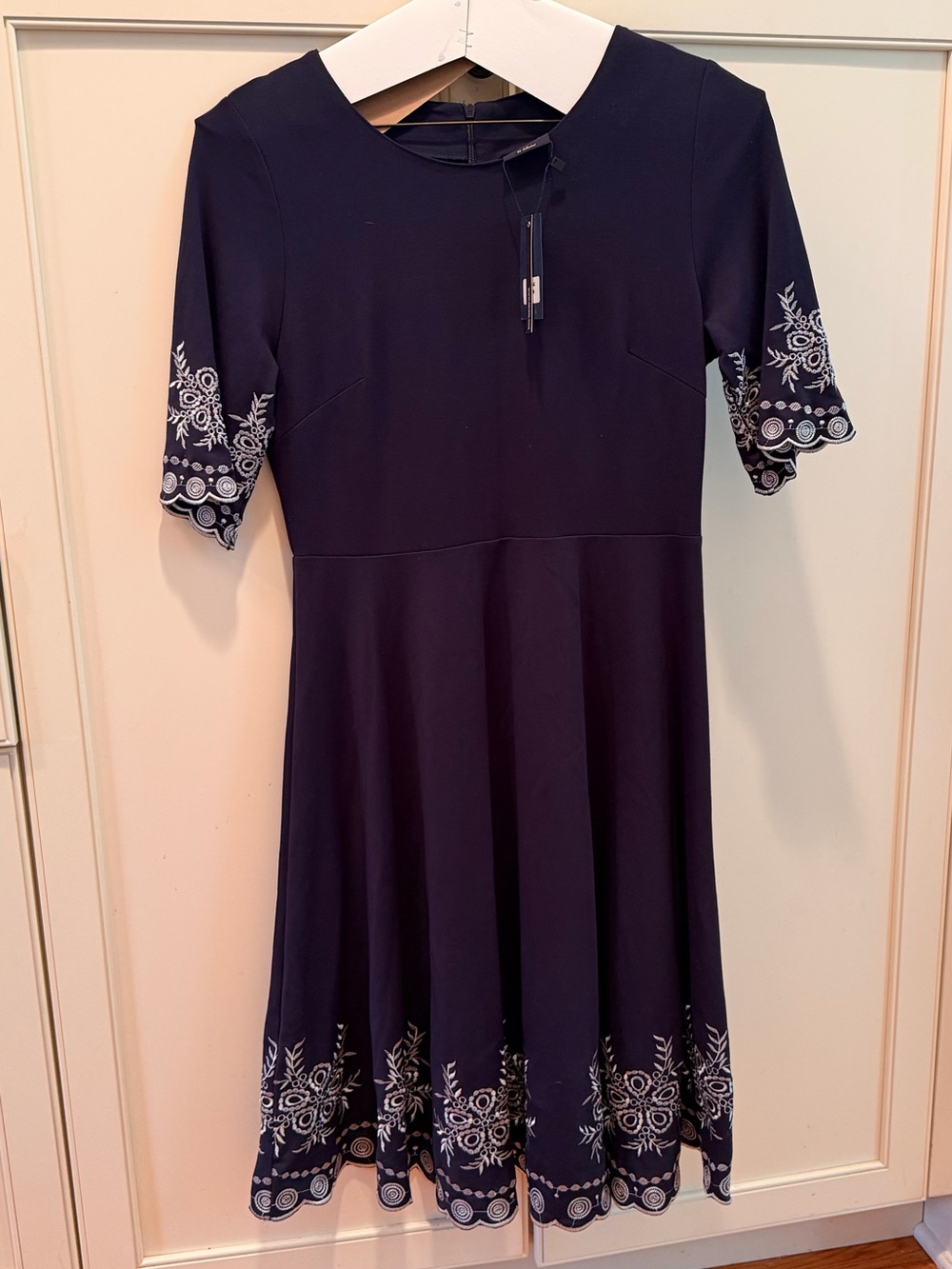 New with tags. Navy Embroidered Fit & Flare Dress
